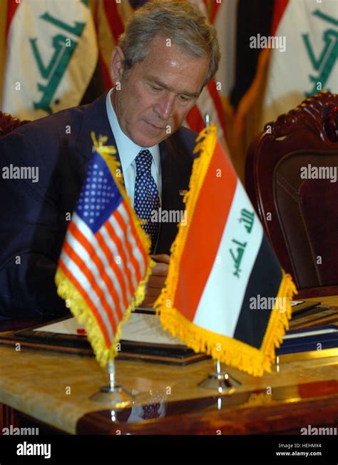 Us President George W Bush Signed Diplomatic Documents In Baghdad Iraq On Sunday December