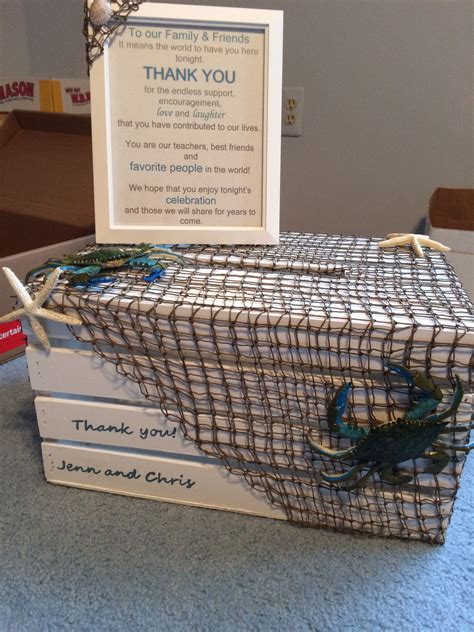 Celebrating a wedding, graduation, anniversary, baby shower or retirement? Our DIY card box! Bought the wooden box from Michaels, painted it white and draped a fish net ...
