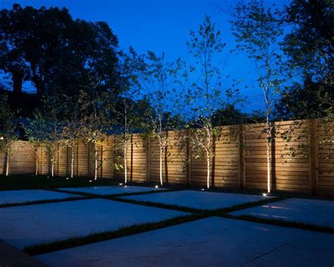 Modern Fence With Night Light And Tree Line Renting A House Wood