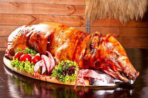 History Of The American Pig Roast Gricos Classic Cuisine