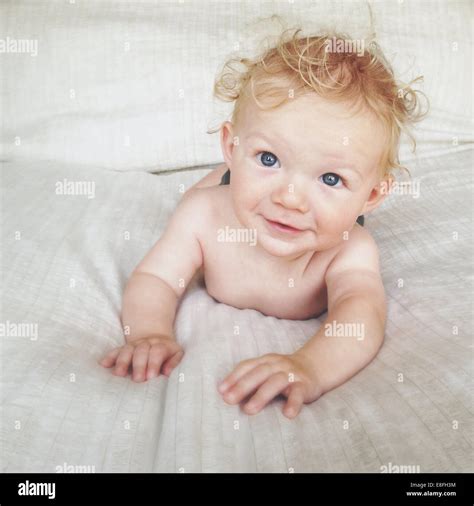 Portrait Of Boy Lying On A Bed Stock Photo Alamy