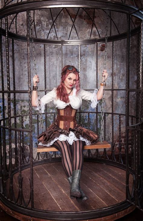 Beautiful Steampunk Woman In The Cage Stock Photo Image Of Costume Looking