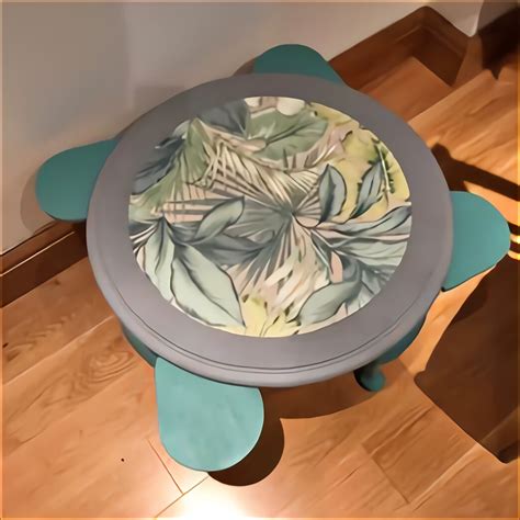 Unique design and very modern coffee table that combines the charming elegance of a tempered glass top, the warmth of glossed walnut detailing, and the modern aura of a chrome finished metal frame. Unusual Coffee Tables for sale in UK | View 42 bargains