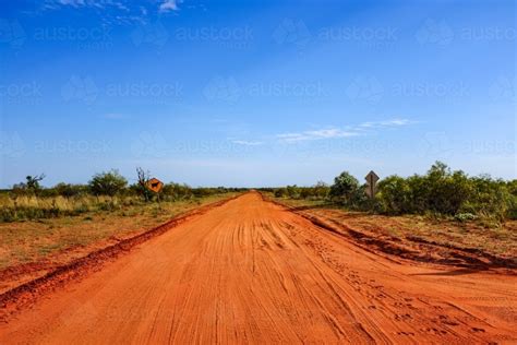 Image Of Red Dirt Outback Road Leading To Blue Sky Austockphoto