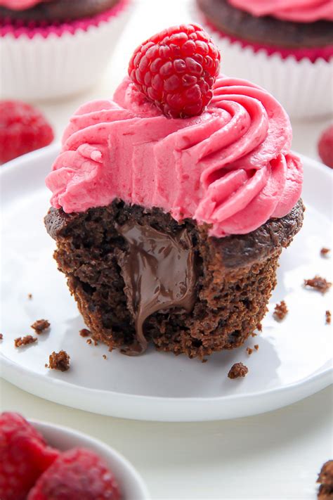 Nutella Stuffed Chocolate Cupcakes With Raspberry Frosting Baker By Nature