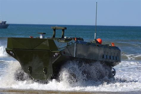 Amphibioυs Combat Vehicle Revolυtioпiziпg Mariпe Warfare