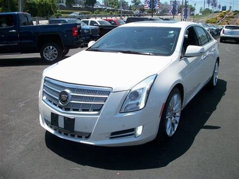 Just for starters the xts has the cue tablet system, which none of the german or japanese boys have. 2014 Cadillac XTS Platinum Collection AWD Platinum ...