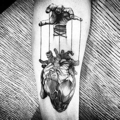 Finally, many people decide to deviate from the standard frames of armband tattoo designs and come up with their own, which comes with unique meaning as it is. 60 Puppet Tattoo Designs For Men - String Ink Ideas