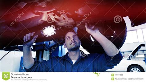 Mechanic Shining Torch Under Car Stock Photo Image Of Occupation