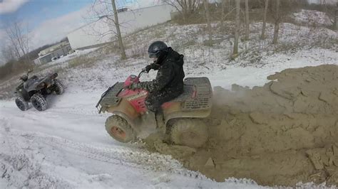 Polaris Sportman 500 Mudding With A Honda Rancher 420 4x4 Atv Youtube