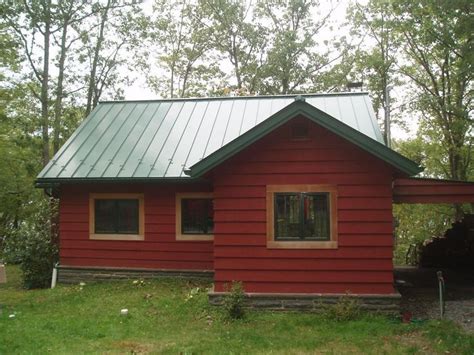 Cedar Siding House With Green Metal Roof Musicianwork