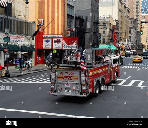 Ladder Truck 4 Fdny Fire Department New York Drives Along Eigth Avenue