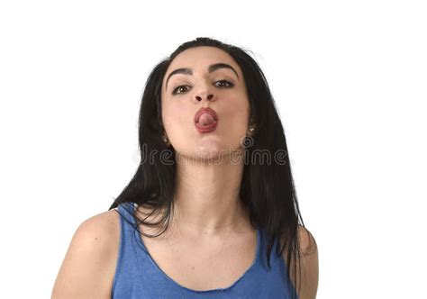 Attractive And Playful Woman Sticking Out Tongue In Funny Fresh Face Expression Mocking Stock