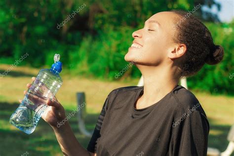 Woman Drink Water After Exercise Stock Photo By ©guruxox 119190800