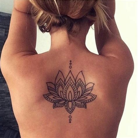 These henna stencils are an easy way to add a dash of color. Mehendi Lotus on Back | Best Tattoo Ideas Gallery