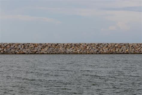 Large Stones Was Prepared In Place Of The Sandy Beach For The Wave