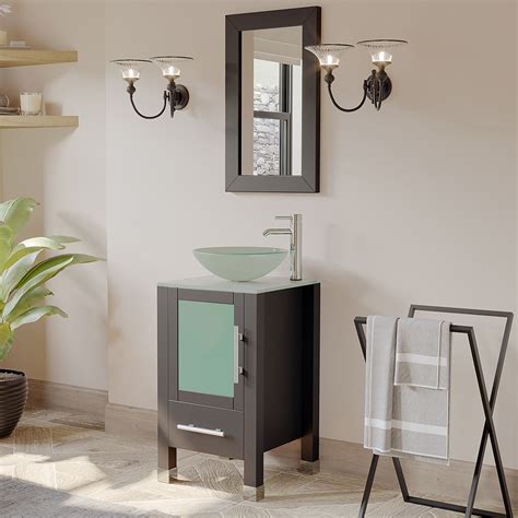The vessel sink harkens back to those days as it sits atop the vanity cabinet, not within it as traditional sinks do. 18" Solid Wood Cabinet & Tempered Glass Counter Top and ...