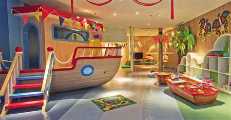The Childrens Playroom Is Decorated In Bright Colors And Features An