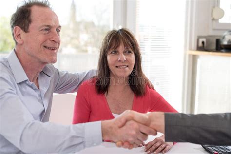 Senior Couple Shaking Hands With Realtor Stock Image Image Of Happy Business 93328253