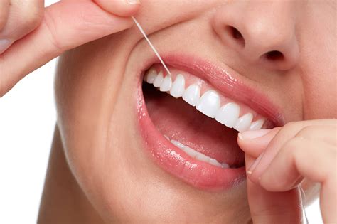 a step by step guide on how to properly floss your teeth