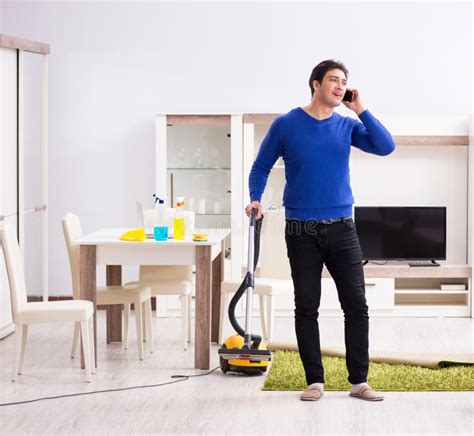 Young Man Vacuum Cleaning His Apartment Stock Image Image Of Divorced