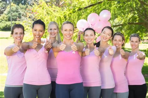 Smiling Women In Pink For Breast Cancer Awareness Stock Photo By