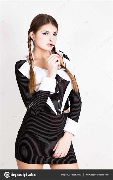 Sexy Secretary Portrait Of Beautiful Brunette Business Lady Wearing In Pinstripe Suit Biting