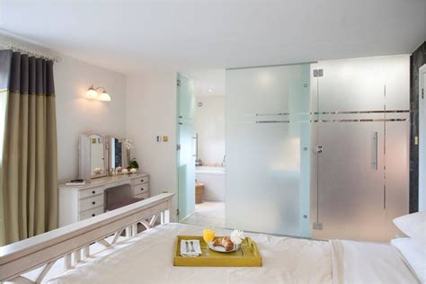 Bedroom En Suite Glass Walls White Wooden Bed Increation Modern