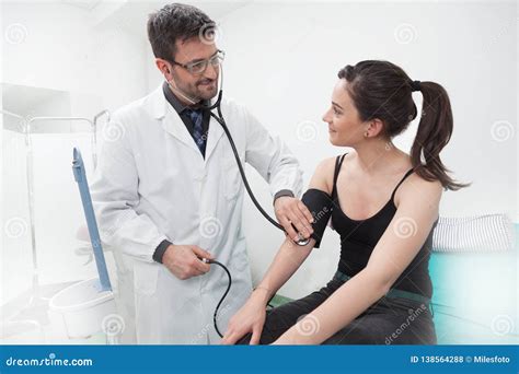 Doctor Examination Of A Young Lady With Stethoscope Stock Photo Image