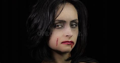 Vampire Halloween Makeup Woman Portrait With Blood On Her Face Stock