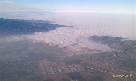 Clouds Splash Over The San Bernardino Mountains In Oak Hills Ca San