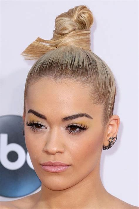 Rita Ora Straight Golden Blonde Bun Dark Roots Hairstyle Bun