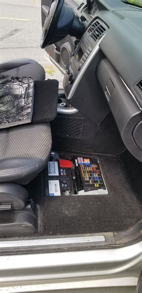 This Mercedes Hides Its Battery And Fuse Box Under The Floor Board Of