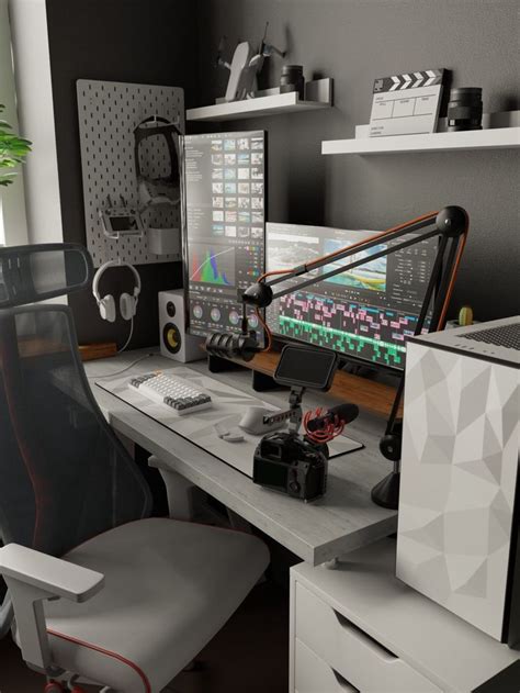 A Computer Desk With Two Monitors And Headphones On It Next To A Chair