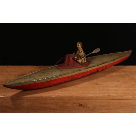 An Early 20th Century German Tinplate And Clockwork Rowing B In
