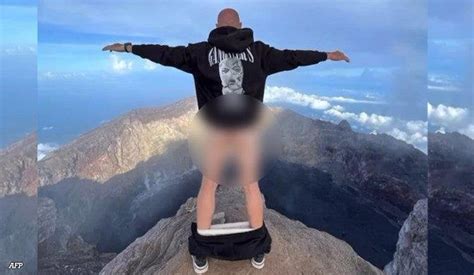 Russian Tourist Deported From Bali Over Half Naked Photo On Sacred Peak