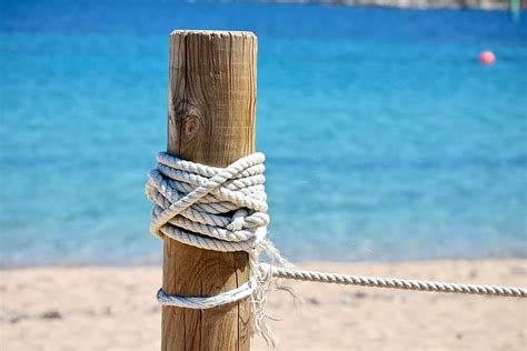 Hd Wallpaper Rope Tied On Wooden Pole Sea Beach Costa Waters Sand