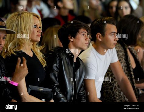 pamela anderson dylan jagger lee and brandon thomas lee attending front row of the saint