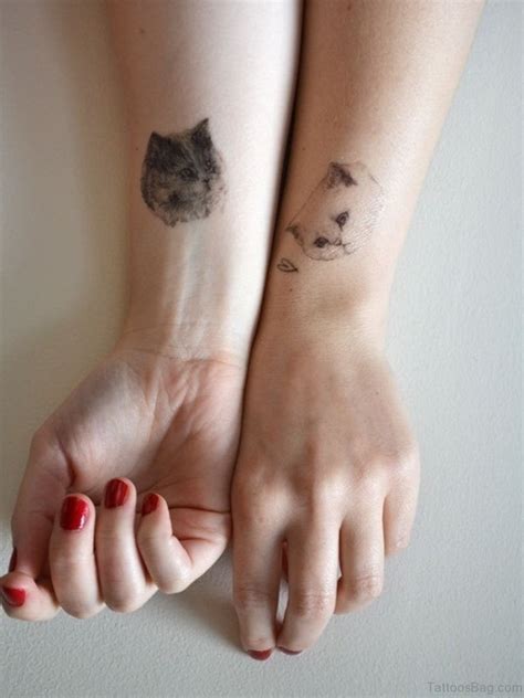 31 Cute Cat Tattoos For Wrist