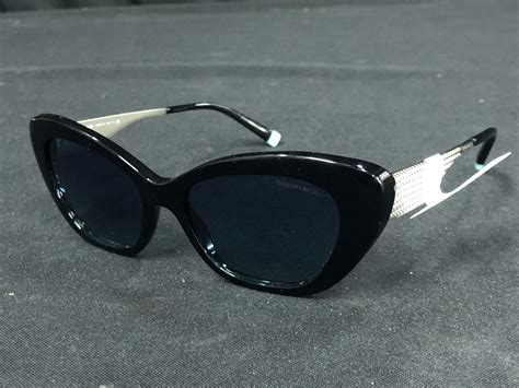 2 Pairs Of Sunglasses Able Auctions