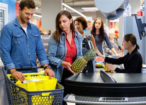 People Buying Goods In A Grocery Store Stock Photo Image Of Payment