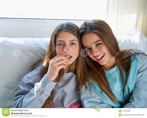 best friend girls watching tv cinema best friend girls watching stock image image of portrait