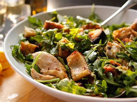 Spoon the salad onto plates, top with the chicken and serve. Roast Chicken With Bread and Arugula Salad Recipe | Ina ...
