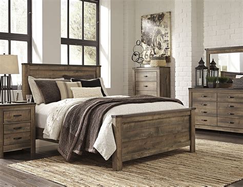 I was a bit concerned if the king size bed would be stable enough with only four support legs, but that thing is rock solid. Trinell Queen Panel Bed | King bedroom sets, Wood bedroom ...