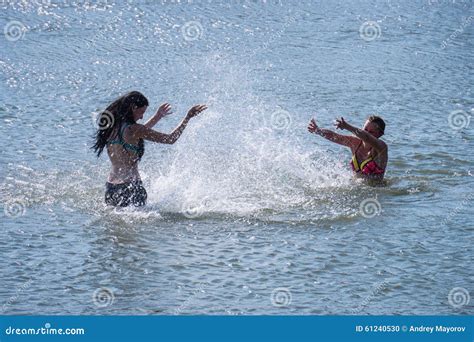 girls squirting water editorial image image of girls 61240530
