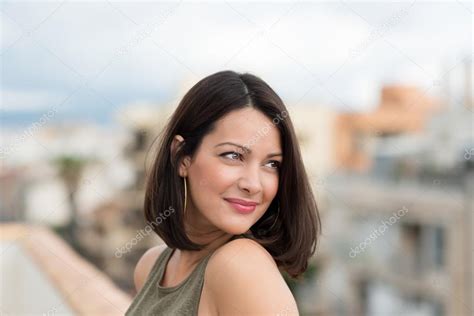 Smiling Beautiful Woman Looking Back Stock Photo By ©racorn 48790491