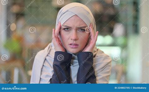 Portrait Of Exhausted Young Arab Woman Having Headache Stock Image