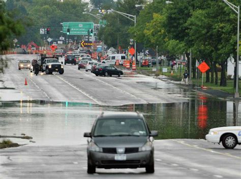 Floods Swamp Roads After Heavy Rainfall