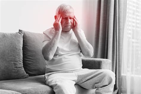 Premium Photo Senior Man Is Suffering From Headache At Home