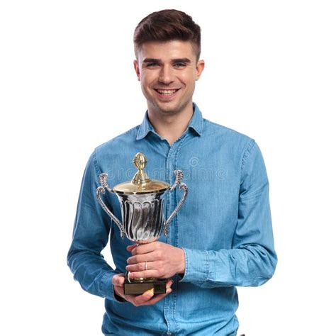 Happy Young Casual Man Holding His Trophy Cup Award Stock Image Image